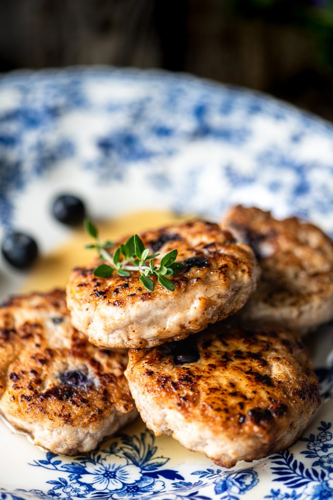 Maple-Blueberry Breakfast Patties Platted with Syrup