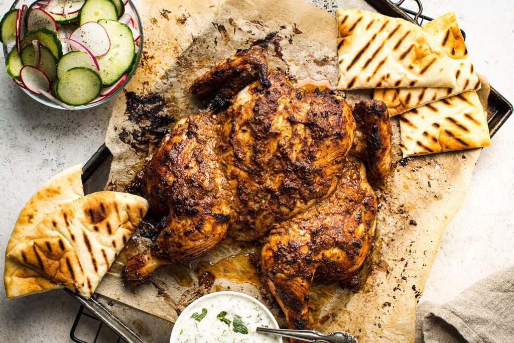 Spatchcocked Tandoori-Style Chicken with Cucumber Salad & Naan